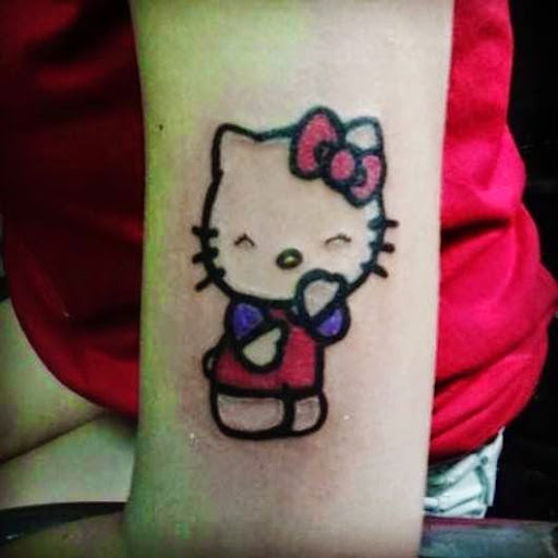 Explore female neck tattoo ideas, creative tattoo ideas in Miami, available at Ink Rising Tattoo