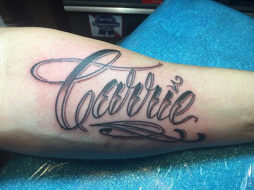 Explore dachshund tattoo ideas, creative tattoo ideas in Peoria, available at Modern Ink Tattoo
