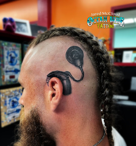 Find poppy tattoo ideas for your next unique tattoo in Minneapolis at Ocean Blue Tattoo & Art Studio