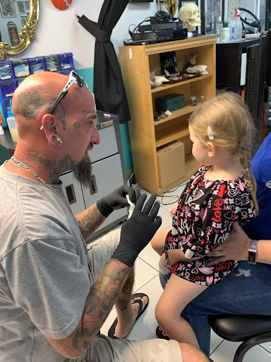 Explore tattoo cover up ideas for dark tattoos, creative tattoo ideas in Saint Petersburg, available at Edens Apple Tattoos and Piercings