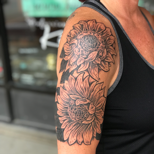 Explore male flower tattoo ideas, creative tattoo ideas in Aurora, available at Ronin Tattoo Studio INC