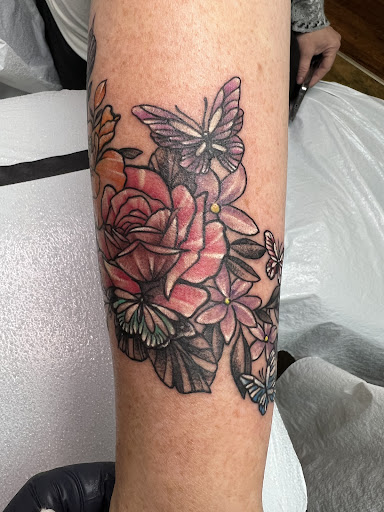 Explore family birth flower tattoo ideas, creative tattoo ideas in Adrian, available at Good Life Tattoo Co.