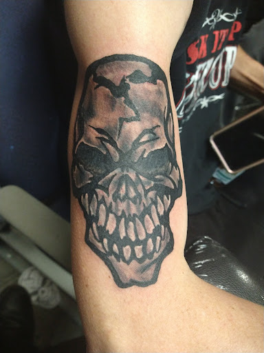 Explore rottweiler tattoo ideas, creative tattoo ideas in Halethorpe, available at Razors Edge Tattoo And Piercing Studio