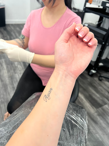 Explore cover up tattoo ideas female wrist, creative tattoo ideas in Garden Grove, available at Red Blossom Art Studio