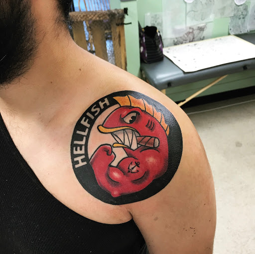 Explore venom tattoo ideas, creative tattoo ideas in Wilmington, available at Lost Harbor Tattoo