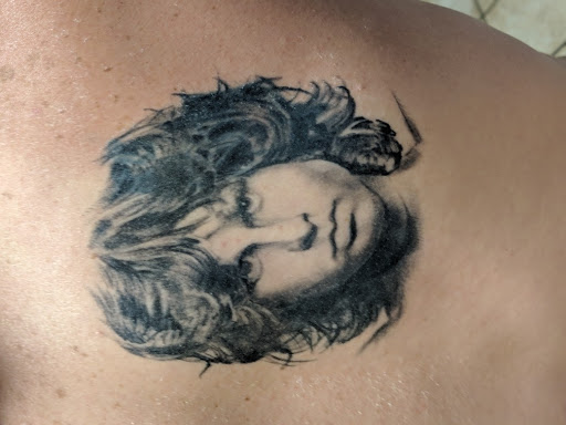 Explore tattoo over scar ideas, creative tattoo ideas in Belton, available at Not Just Ink Tattoos And Body Piercing