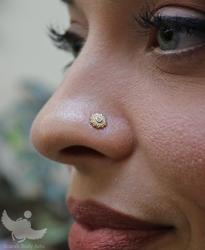 Explore pcos tattoo ideas, creative tattoo ideas in Syracuse, available at Scarab Body Arts