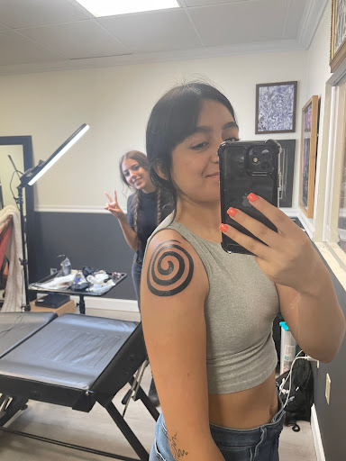 Explore thigh tattoo ideas woman, creative tattoo ideas in Naples, available at Vamp Ink Tattoos