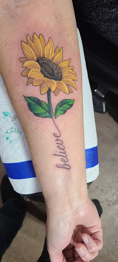 Explore women's arm tattoos ideas, creative tattoo ideas in Stetsonville, available at Solace Ink Company LLC