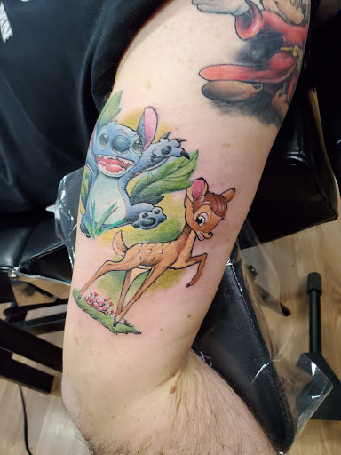 Explore music tattoo ideas for females, creative tattoo ideas in Council Bluffs, available at Lil Bros Tattoo