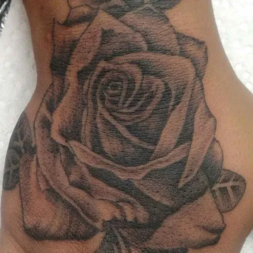 Explore mother son tattoos ideas, creative tattoo ideas in Stephenville, available at King of Hearts Tattoo (NO PIERCING)