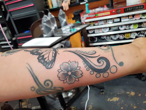 Explore tech tattoo ideas, creative tattoo ideas in Pineville, available at Epic Ink Studio