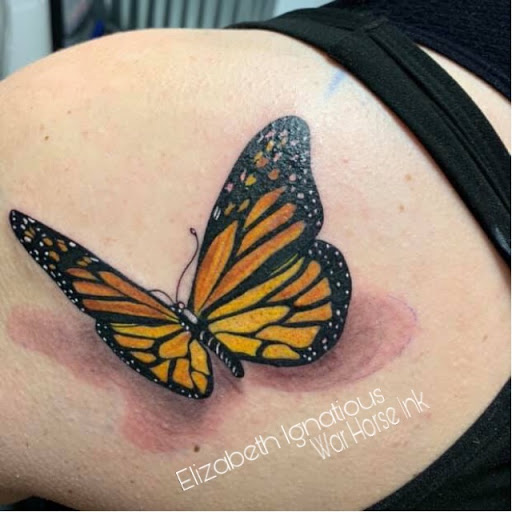 Explore tattoo ideas upper back, creative tattoo ideas in Kent, available at War Horse Ink