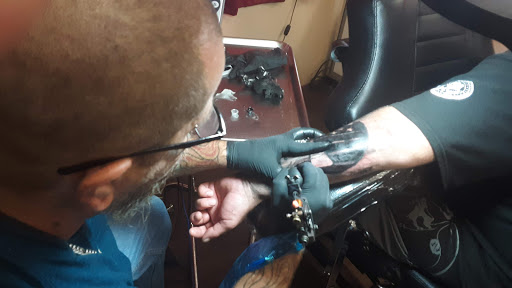 Explore women's arm sleeve tattoo ideas, creative tattoo ideas in Fort Mohave, available at RedRum Tattoo & Body Piercing Co.