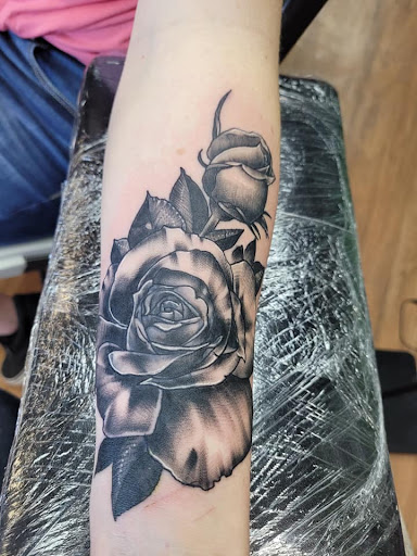 Explore frozen tattoo ideas, creative tattoo ideas in Anniston, available at Lucid Dreams Tattoos and Piercings