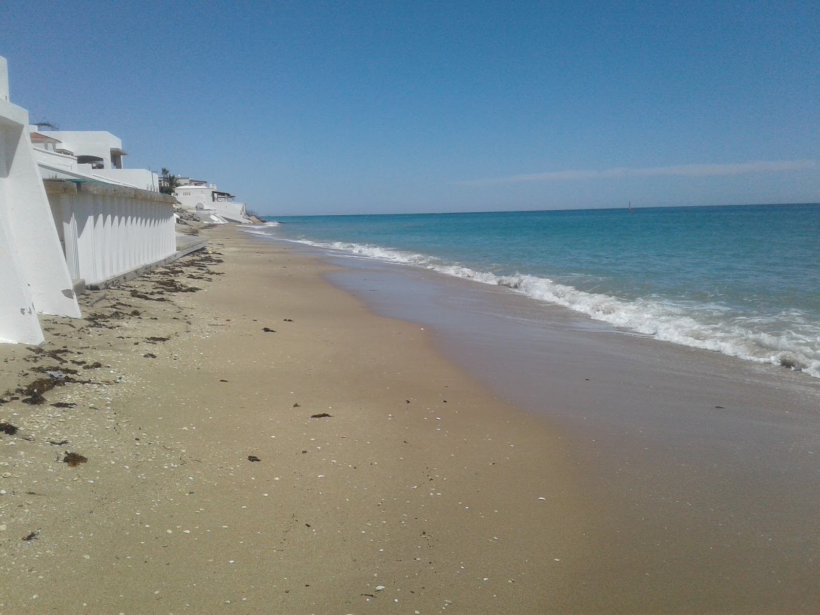 Foto av Playa Del Este med lång rak strand