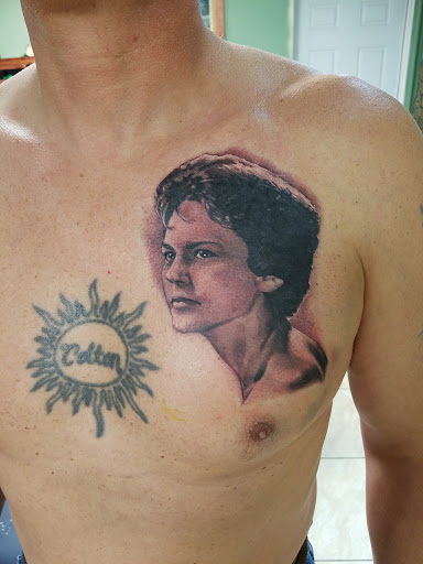 Explore unique side thigh tattoo ideas, creative tattoo ideas in Odenton, available at Naked Art Tattoos