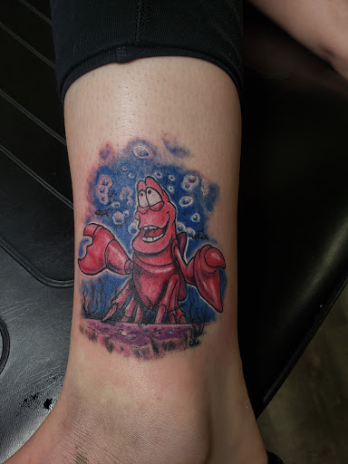 Explore lower back tattoo ideas for females, creative tattoo ideas in Linn Creek, available at Hillard Skillard Tattoos, LLC.