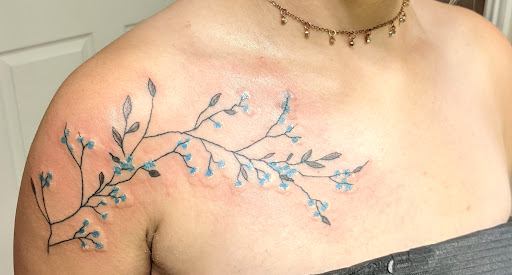 Explore bouquet tattoo ideas, creative tattoo ideas in Pittsburg, available at NeonMoon Tattoo