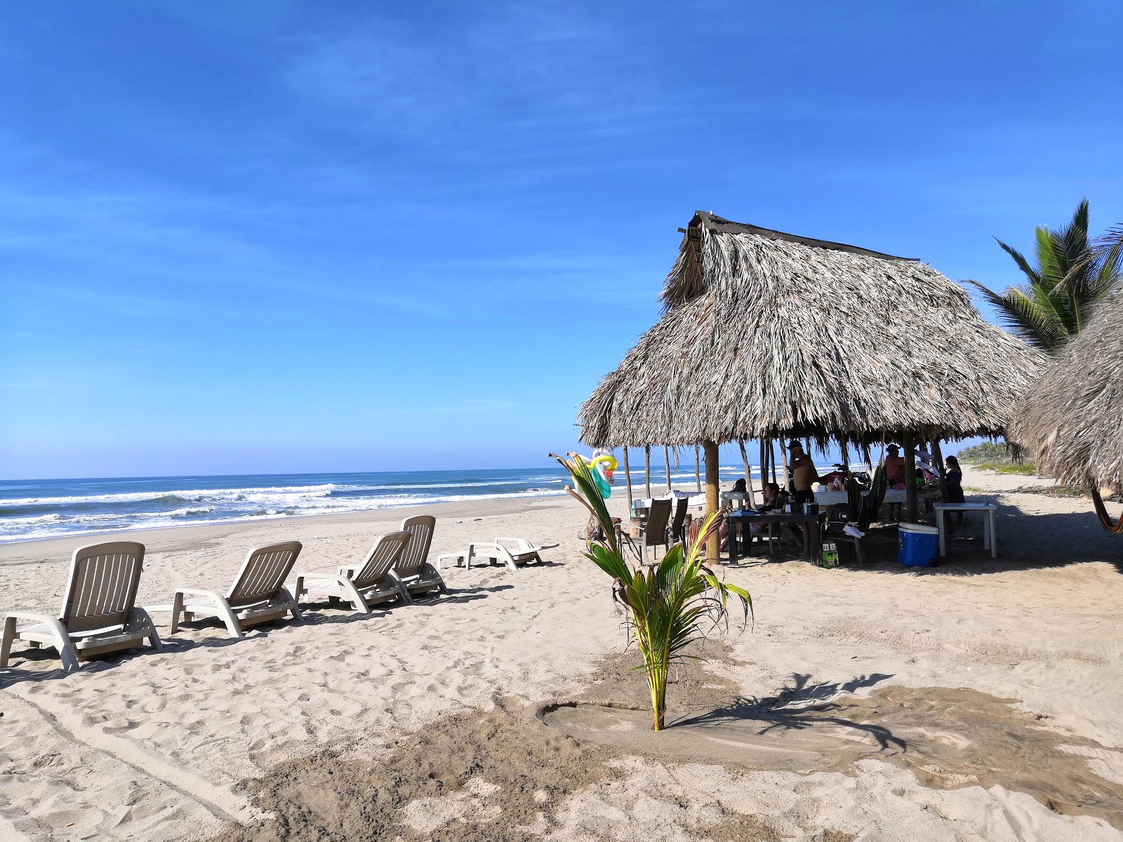 Foto von Playa Barra Vieja und die siedlung
