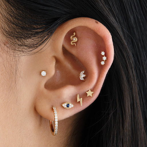 Explore michigan football tattoo ideas, creative tattoo ideas in New York, available at STUDS Rockefeller Center