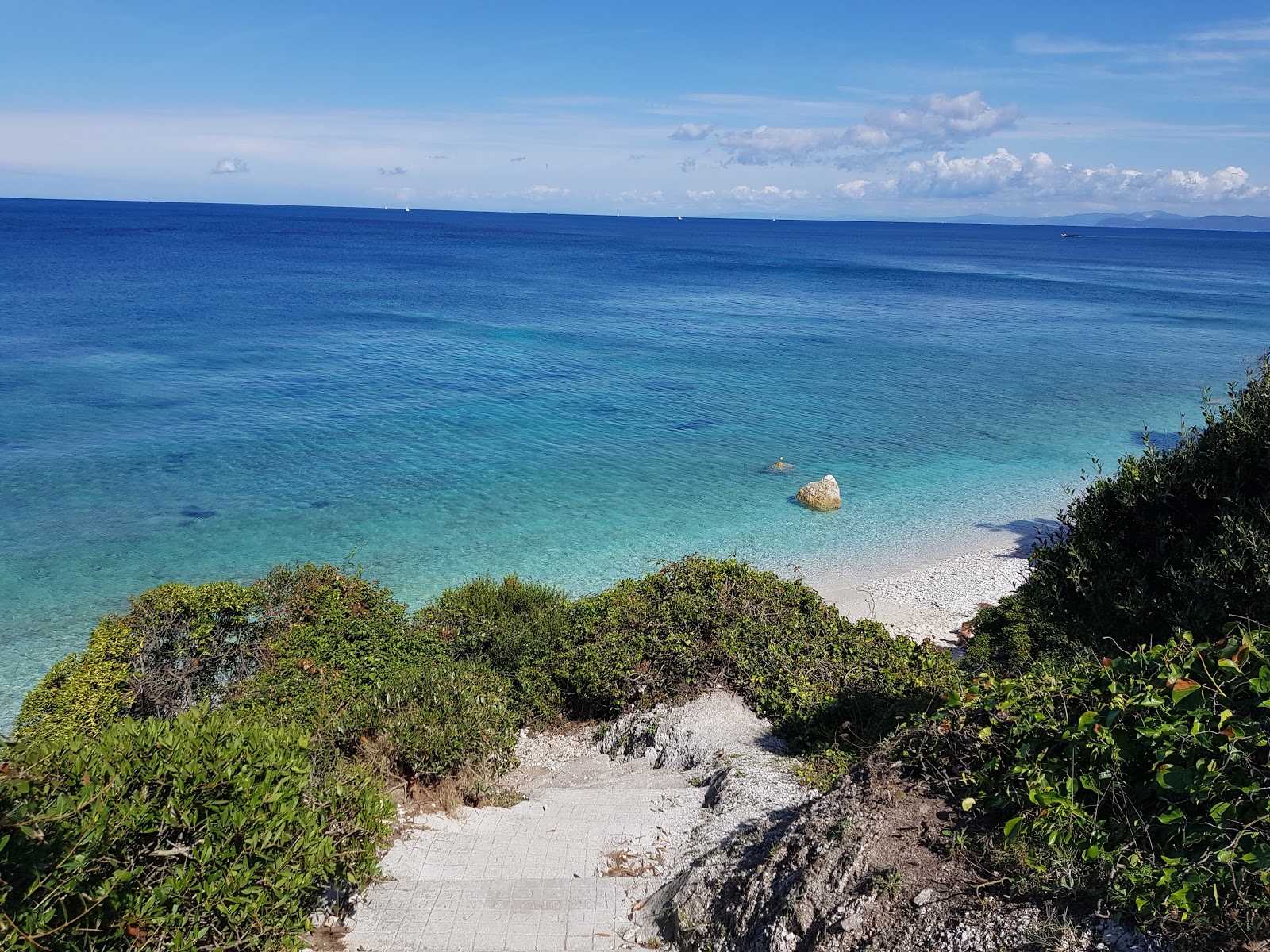 Foto van Spiaggia di Seccione met turquoise puur water oppervlakte