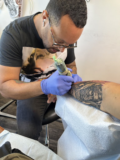 Explore music tattoo ideas male, creative tattoo ideas in Sarasota, available at Oddity Tattoo Art University