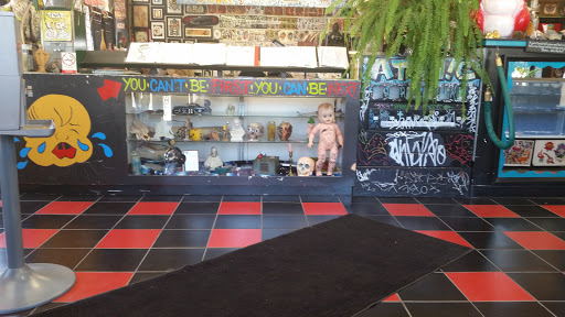 Explore shading ideas for sleeve tattoos, creative tattoo ideas in Milwaukee, available at Atomic Tattoos