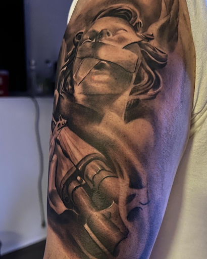 Explore sleeping beauty tattoo ideas, creative tattoo ideas in Dallas, available at Empire barbers & Ink