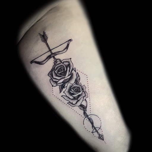 Explore mens tricep tattoo ideas, creative tattoo ideas in Corona, available at Crop Circles Tattoo Studio