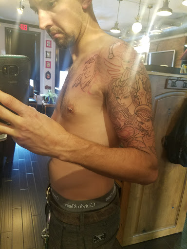 Find garter belt tattoo ideas for your next unique tattoo in Pittsburgh at Kyklops Tattoo