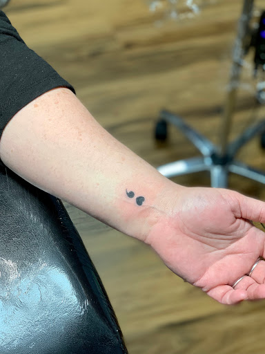 Explore bible tattoo ideas for men, creative tattoo ideas in Powell, available at Elysium Body Enhancements