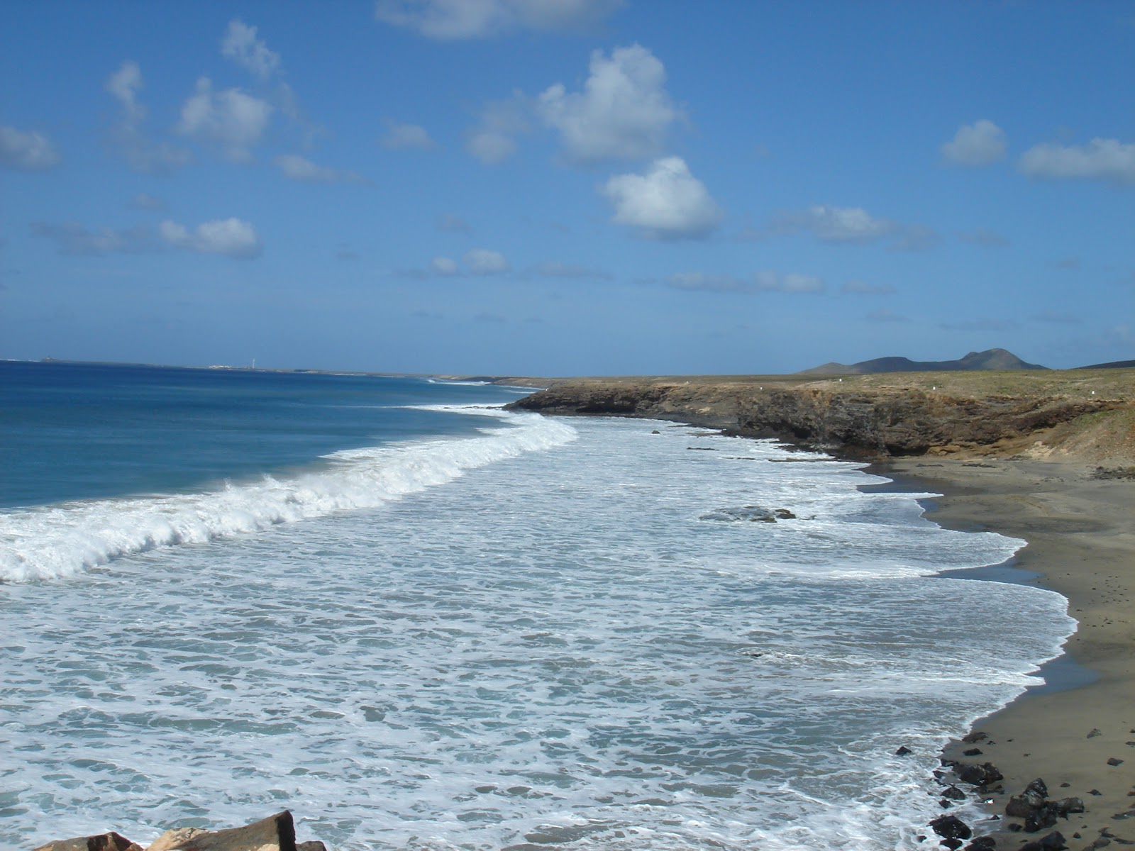 Foto von Playa en Jandia mit heller sand Oberfläche