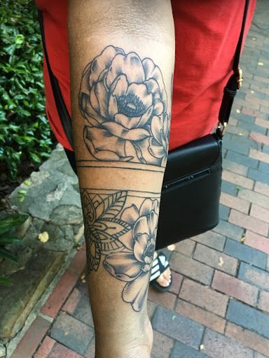 Explore tattoo ideas for travel, creative tattoo ideas in Chapel Hill, available at Golden Falcon Tattoo and Piercing