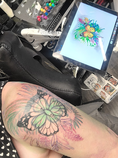 Explore half sleeve tattoo ideas for women, creative tattoo ideas in Westland, available at Black Raven Studio, LLC