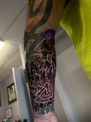 Explore fine line hand tattoo ideas, creative tattoo ideas in Fond Du Lac, available at Underground Ink