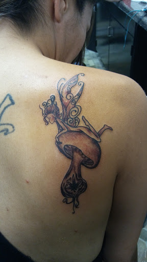 Explore broken glass tattoo ideas, creative tattoo ideas in Big Spring, available at A Mom & Pop Tattoo Shop