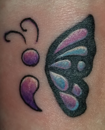 Find skull tattoo idea for your next unique tattoo in Angola at Hoodlum Ink