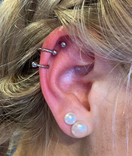 Explore gay couple tattoo ideas, creative tattoo ideas in Asheboro, available at Blue Luna Tattoo Company, LLC