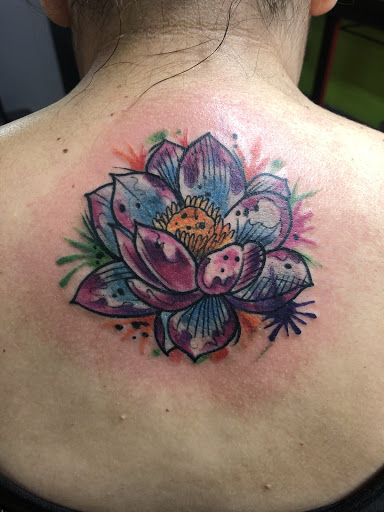 Explore small tattoo ideas for lower back, creative tattoo ideas in Taos, available at Muerte Tattoo Taos