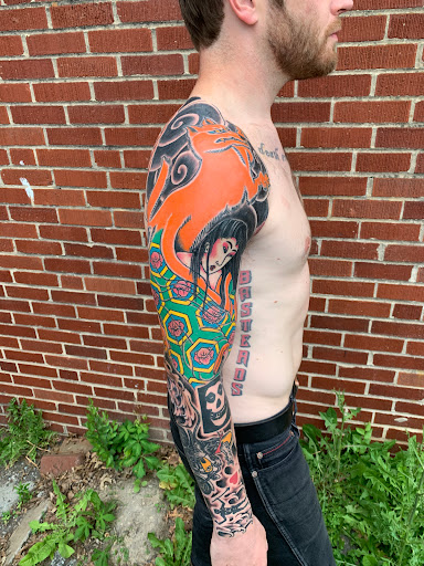 Explore rose tattoo ideas, creative tattoo ideas in Strasburg, available at Champion Tattoo Company