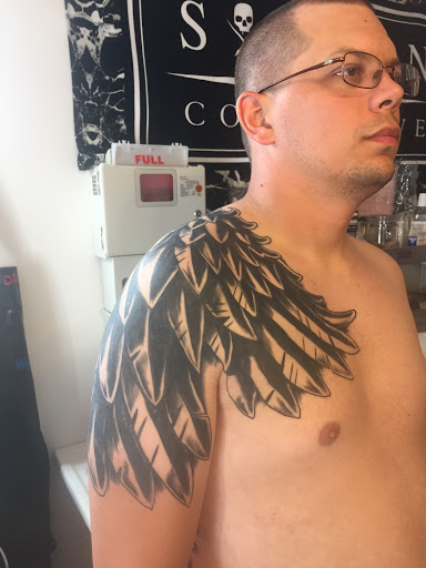 Explore red ink tattoo ideas, creative tattoo ideas in Portland, available at Art Immortal Tattoo and Piercing