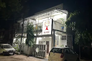 CHANDRAJYOTI VILLA HOME STAY. Property description Chandrajyoti Villa, a property with a garden and a terrace, image