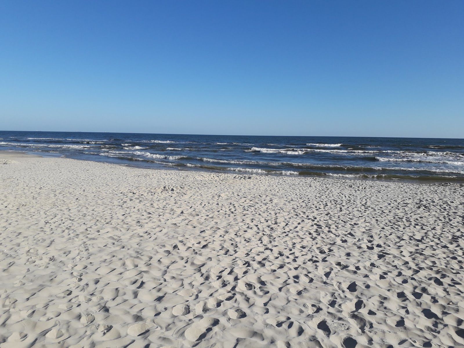 Foto van Junoszyno Beach - populaire plek onder ontspanningskenners