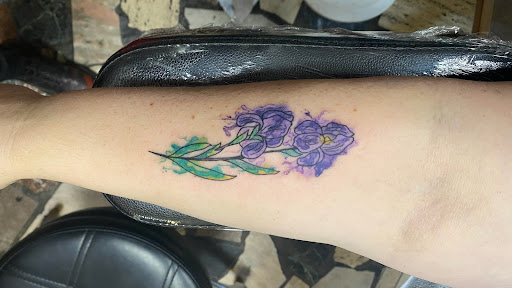 Explore autism puzzle piece tattoo ideas, creative tattoo ideas in New Orleans, available at Downtown Tattoos and Piercing