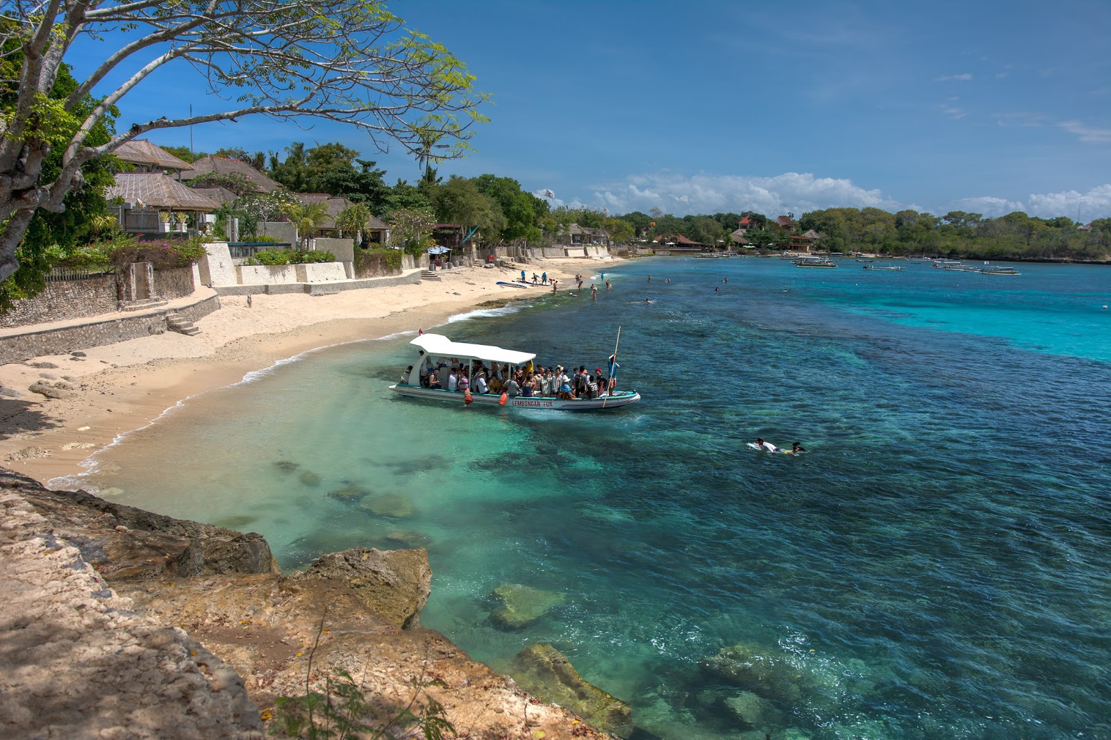 Foto av Tamarind Beach med beige sand yta