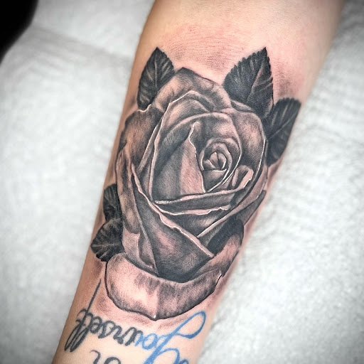 Explore haiti tattoo ideas, creative tattoo ideas in Lakeview, available at Backwoods Tattoo Studio