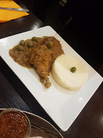 Poulet au curry du Restaurant de spécialités d'Afrique de l'Ouest Afrik'N'Fusion à Paris - n°10