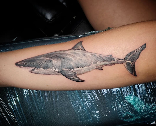 Explore weightlifting tattoos ideas, creative tattoo ideas in Coral Springs, available at Salvation Tattoo Lounge Coral Springs