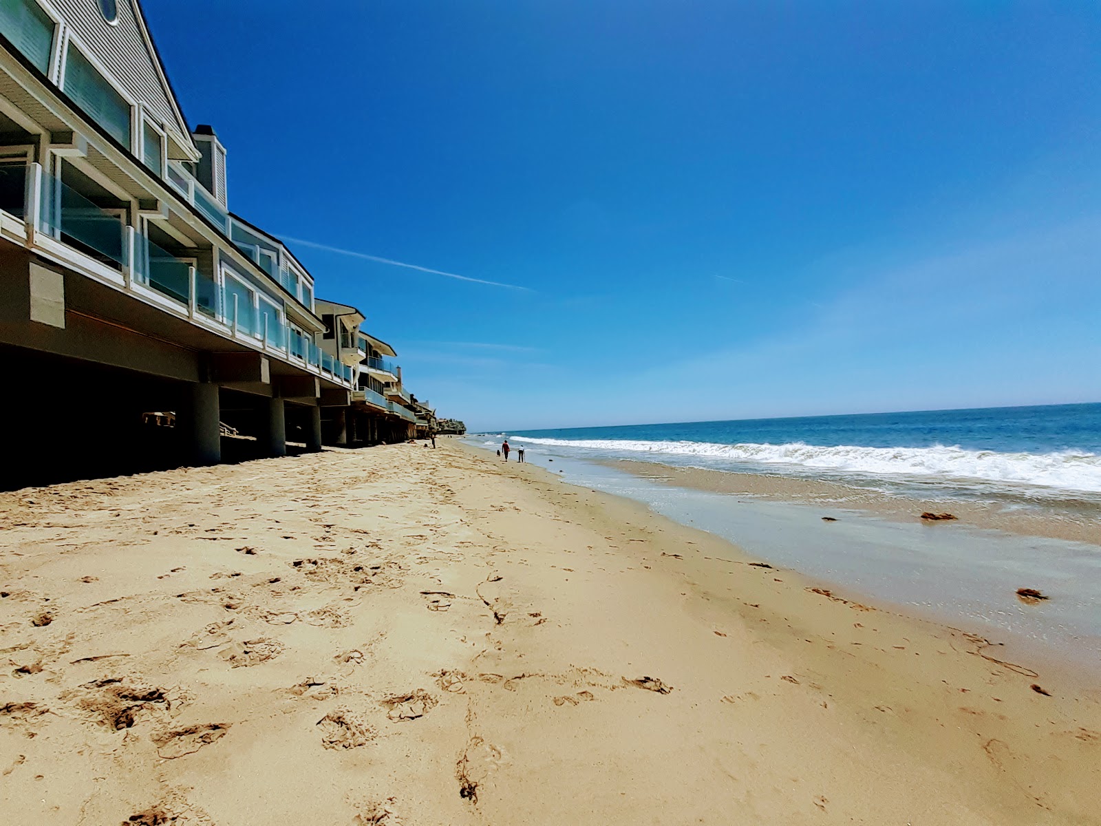 Escondido Beach的照片 带有明亮的沙子表面